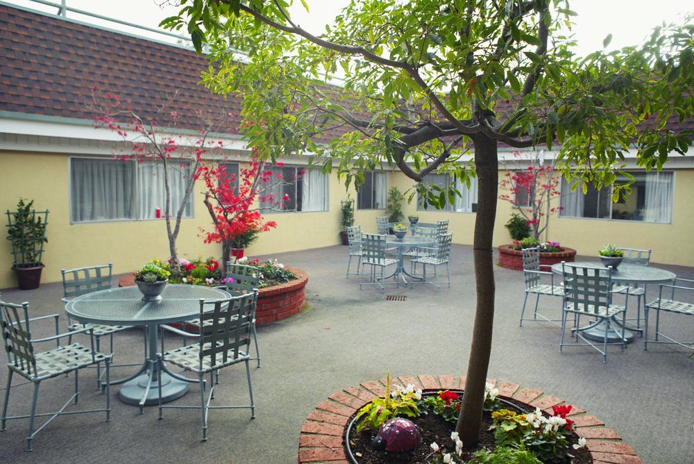 Senior living community at South Marin Health & Wellness Center featuring resort-style architecture and garden.