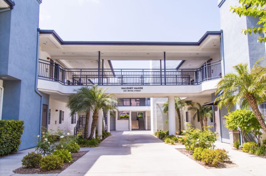 Architectural view of Atherton Baptist Homes, a senior living villa in an urban city setting.