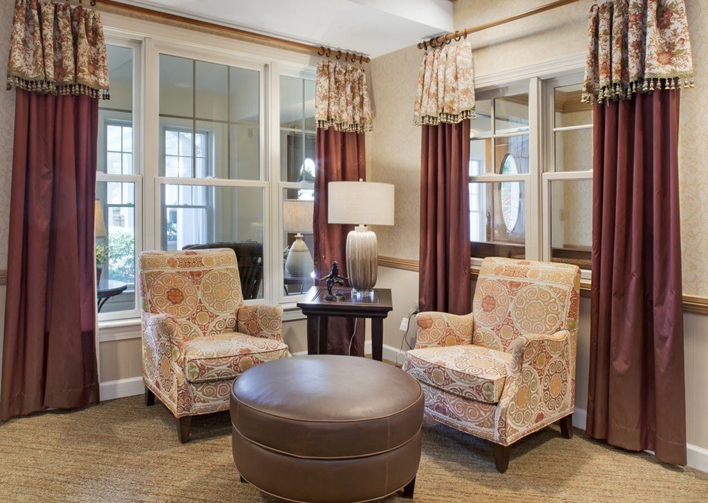 Senior living community, Sunrise Assisted Living of Leawood, featuring furniture and home decor.