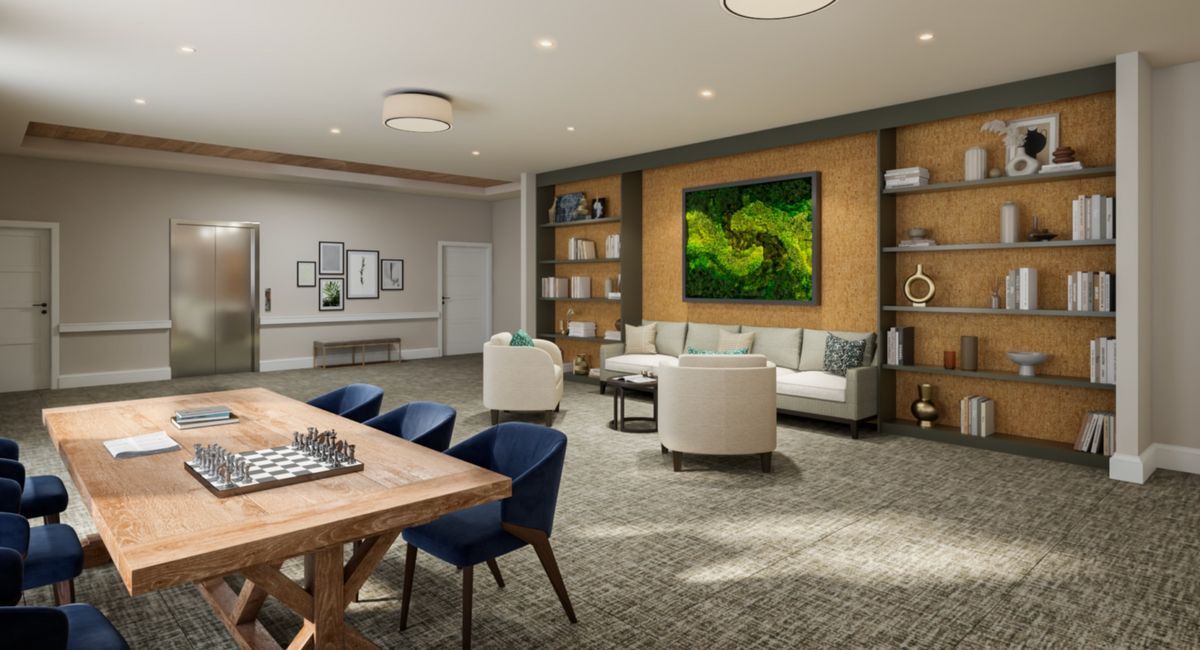 Senior living community interior at The Residence at Bedford featuring elegant decor and chess game.