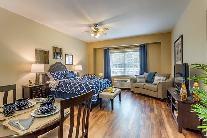 Interior view of Brookdale Belle Meade senior living community featuring furniture, decor, and electronics.