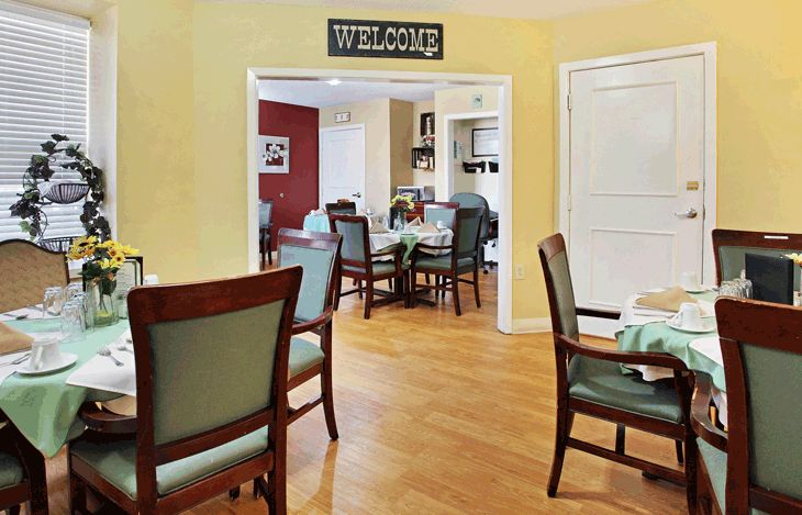 Interior of Willow Grove senior living community in Maumelle with dining room furniture and decor.