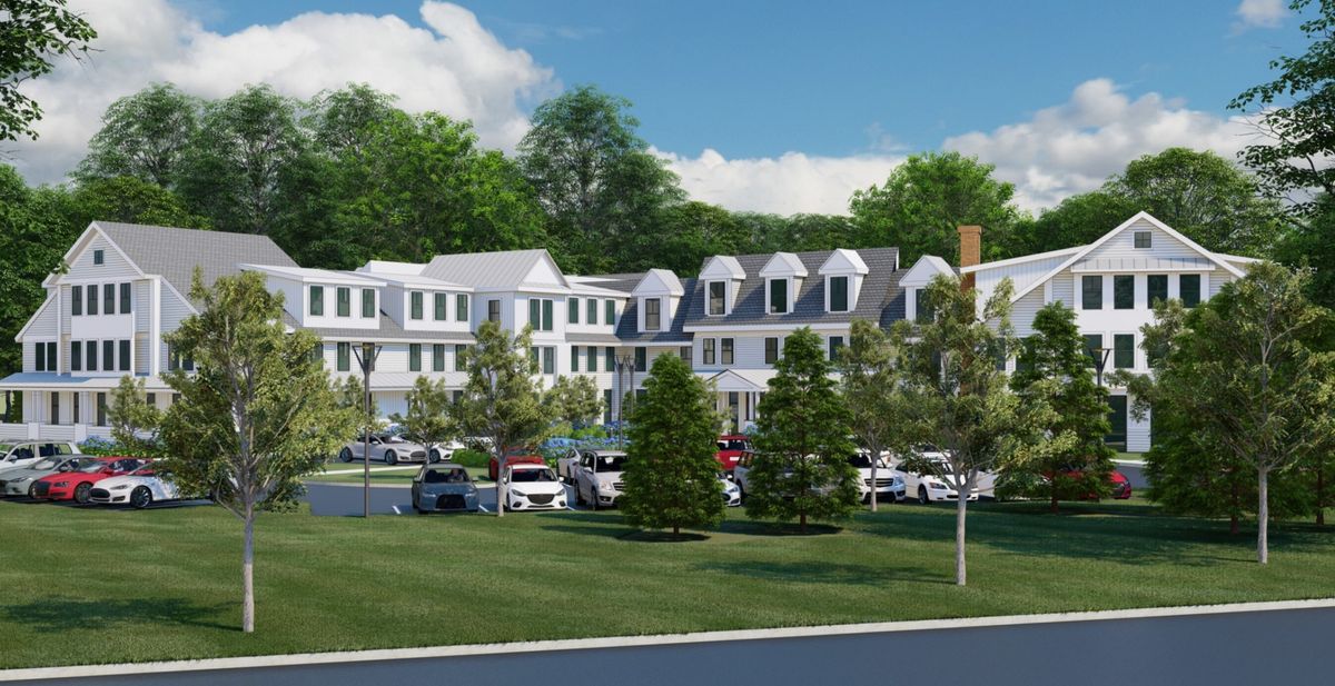 Senior living community, The Residence at Bedford, featuring lush lawns, trees, and modern architecture.
