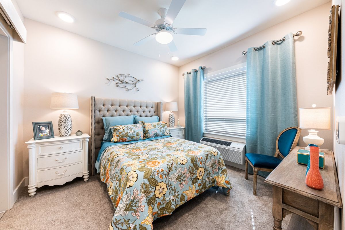 Interior view of Home Decor senior living community featuring furnished bedrooms with modern appliances.