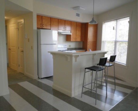 Interior view of St Germain Manor's senior living community featuring a well-designed kitchen.