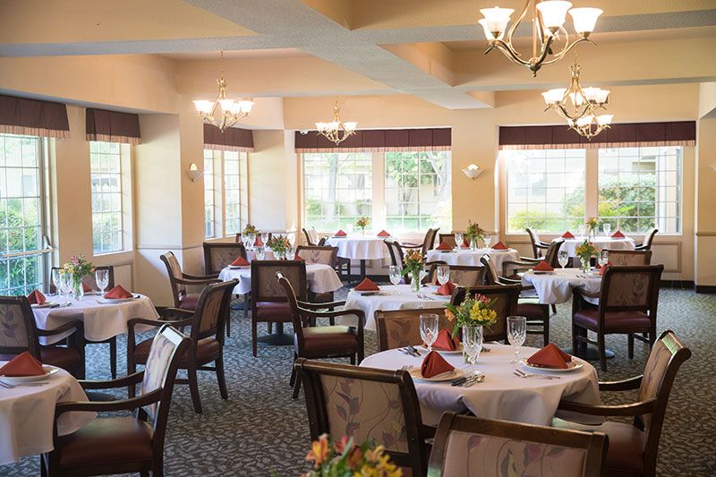 Interior view of Bethel Retirement Community featuring dining room with elegant furniture and decor.