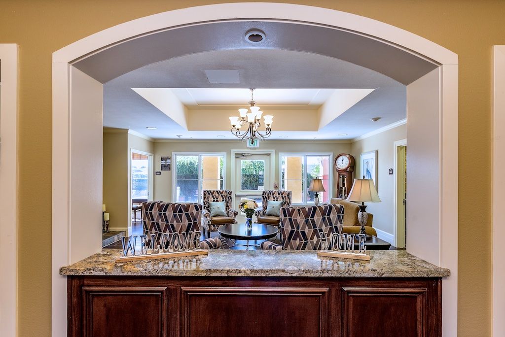 Interior view of Pacifica Senior Living Union City featuring elegant dining room with chandelier.