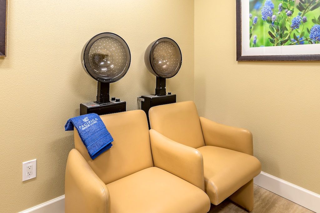 Comfortable furniture setup in the beauty salon at Pacifica Senior Living Union City.