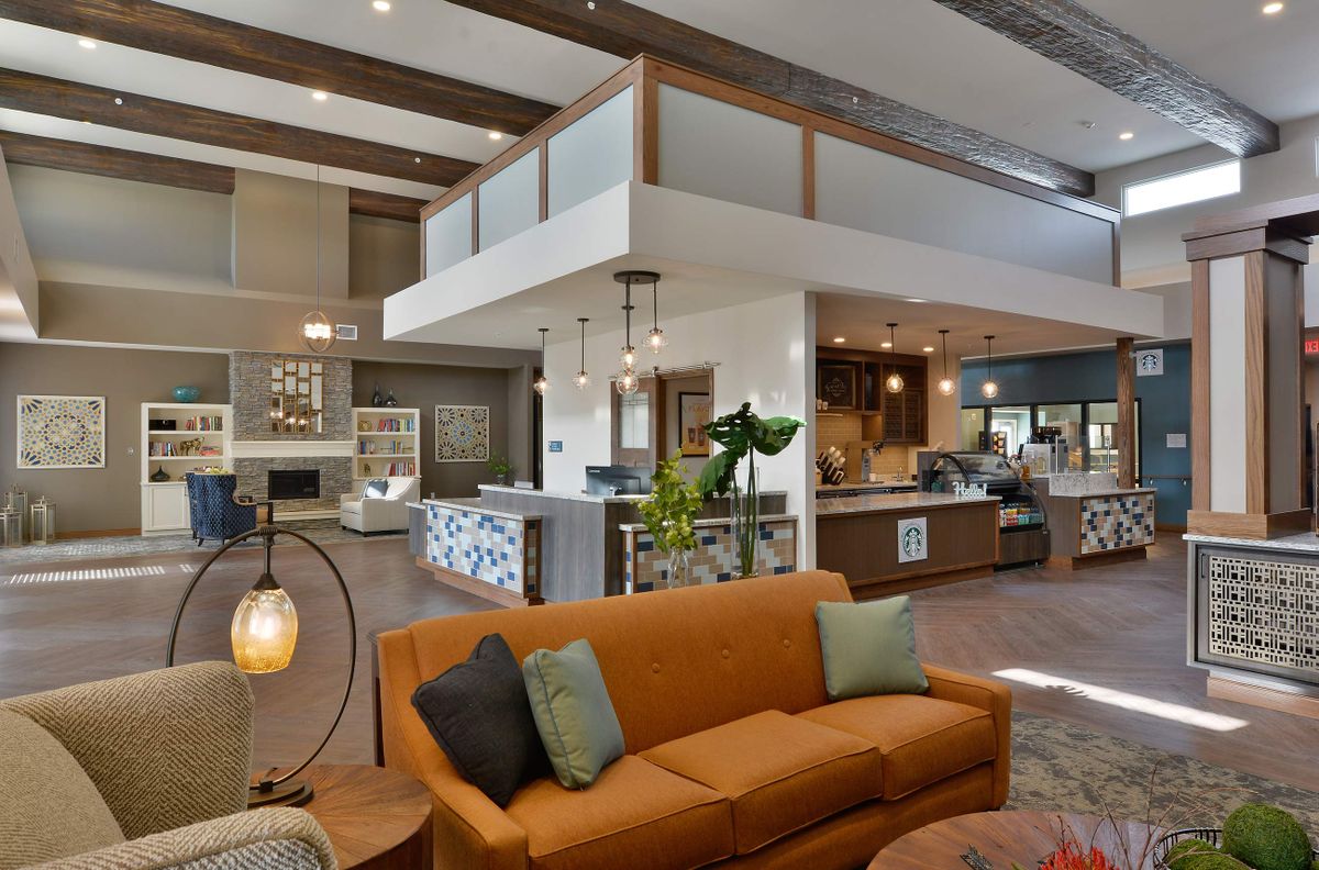 Interior view of Ignite Medical Resort Blue Springs featuring modern decor and furniture.