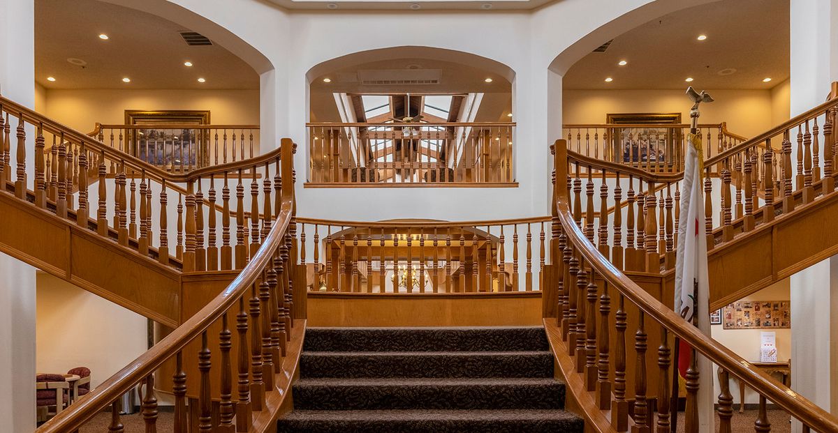 Interior view of Camelot senior living community featuring architecture, housing design, and staircase.