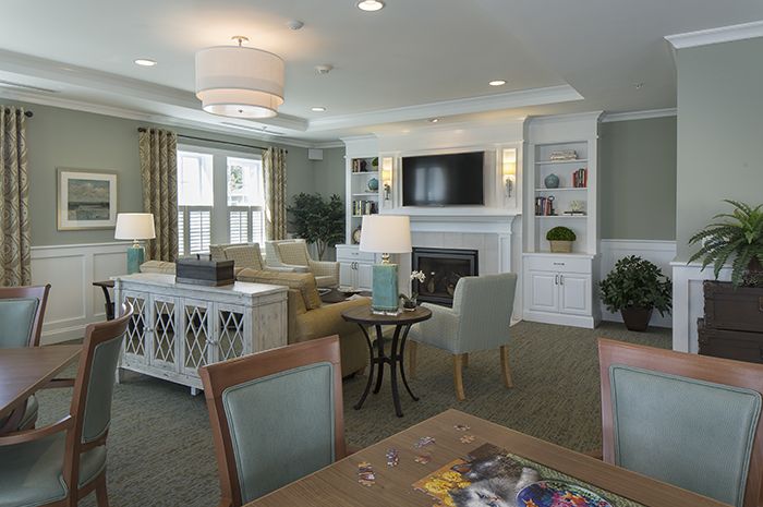 Interior architecture of Brightview Tenafly senior living community featuring dining and living rooms.