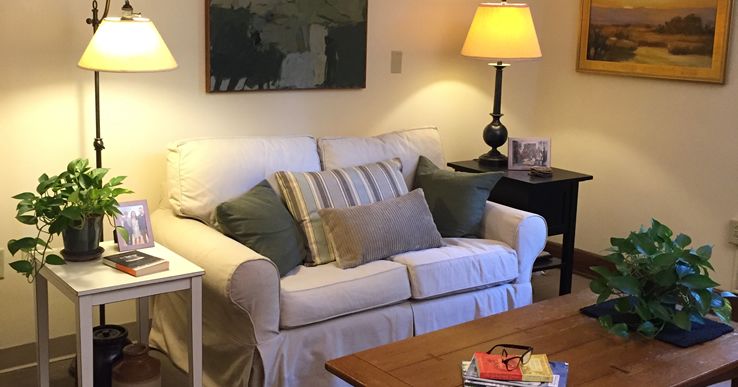 Senior living community interior at Landmark At Longwood featuring cozy living room design.