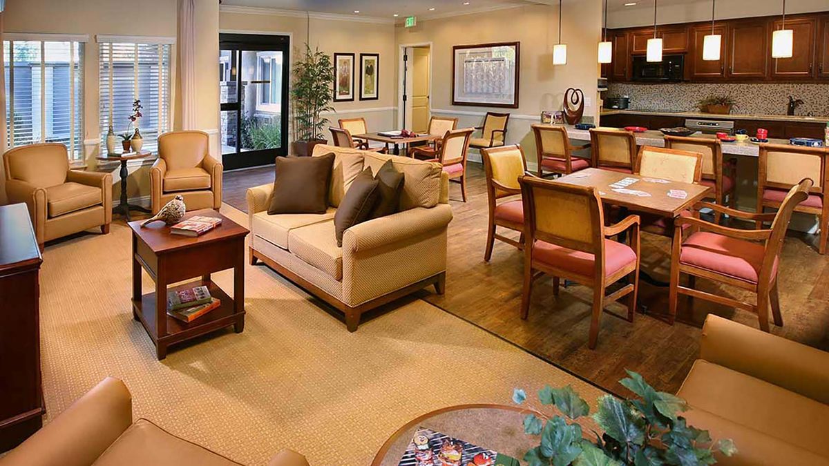Interior view of Atria Golden Creek senior living community featuring elegant home decor.