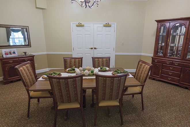 Interior view of Brookdale Johnson City senior living community featuring dining and living room areas.