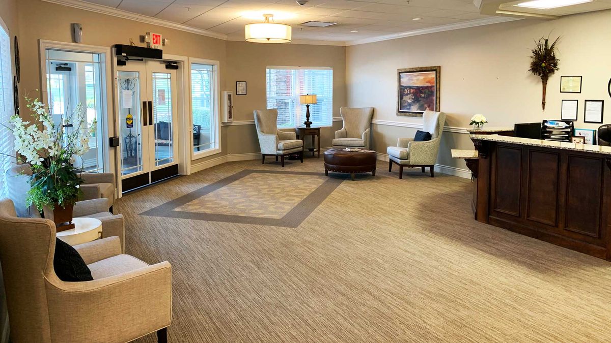 Interior view of Maristone Of Providence senior living community featuring modern decor, art, and electronics.