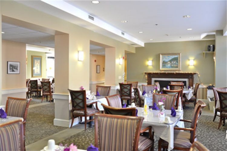 Senior living community, Saint Elizabeth Court, featuring a well-furnished dining and reception area.