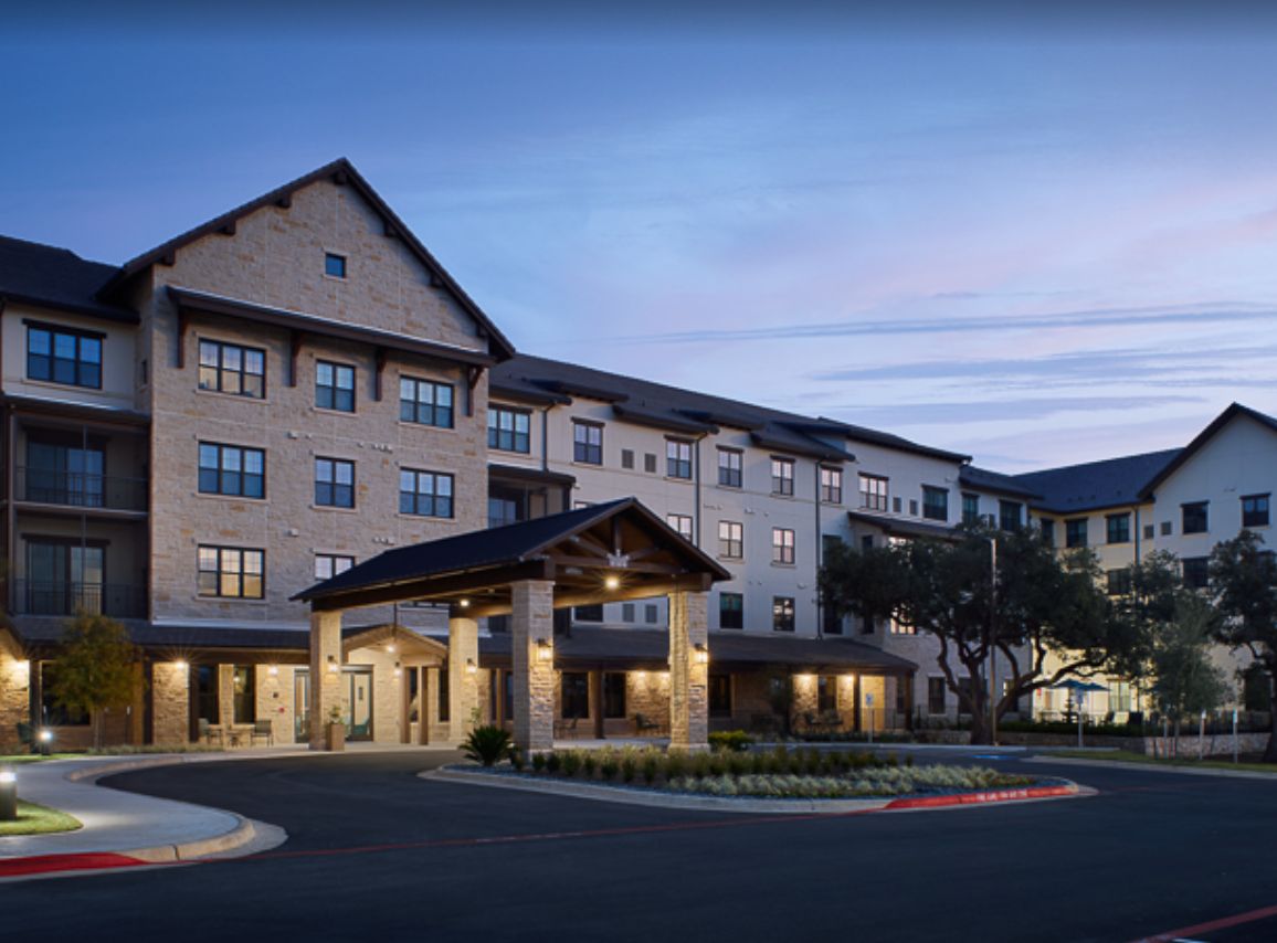 Grand Living at Georgetown senior living community featuring modern architecture in a suburban setting.