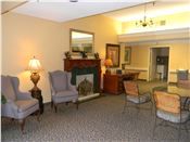 Interior view of Monticello House senior living community featuring a furnished reception room.