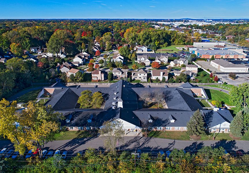 Aerial view of the American House Livonia senior living community in a suburban neighborhood.