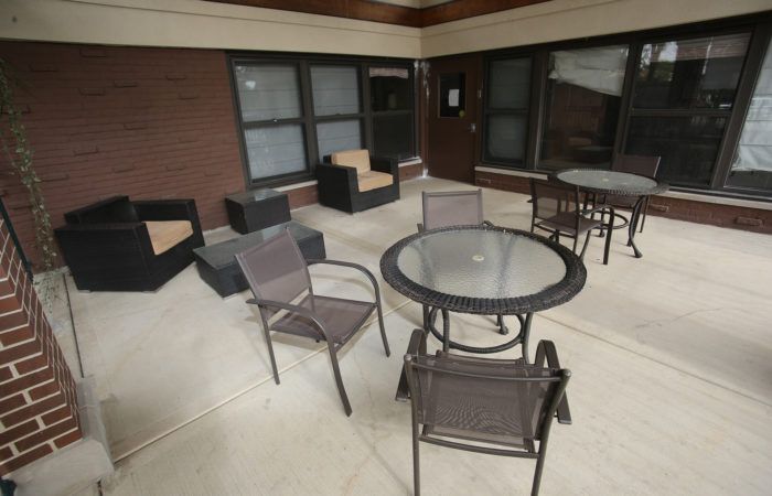 Interior view of Arista Healthcare senior living community featuring modern furniture and design.