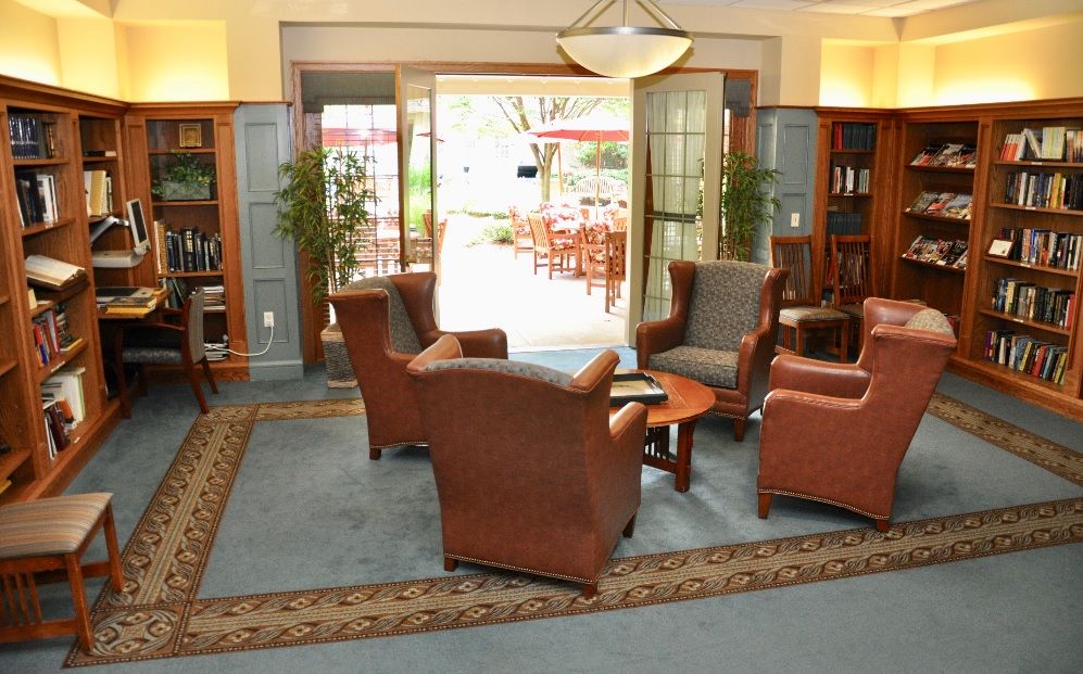 Senior living community interior at The Cliffs at Eagle Rock with cozy furniture and decor.