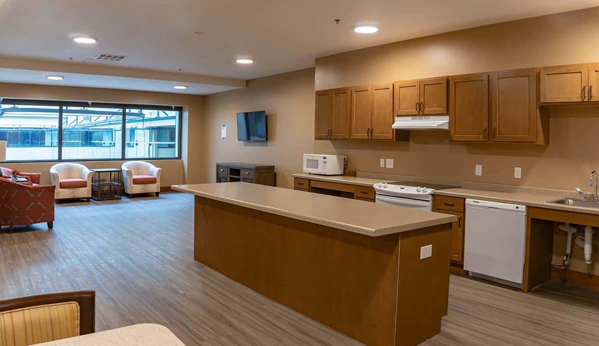 Interior view of Millers Landing senior living community featuring a well-designed kitchen with modern appliances.