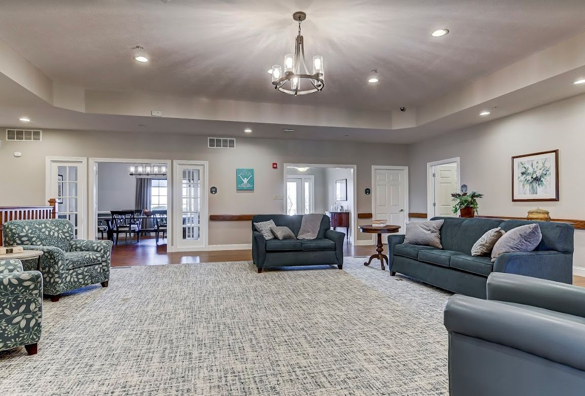 Interior view of River Birch Living South Campus featuring elegant decor, furniture, and art.