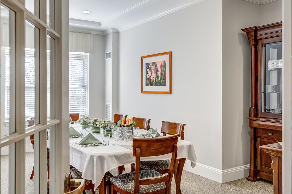 Interior view of Chestnut Park At Cleveland Circle senior living community featuring dining room decor.