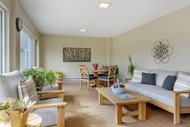 Interior view of Brookdale Cushing Park senior living community featuring modern furniture and decor.