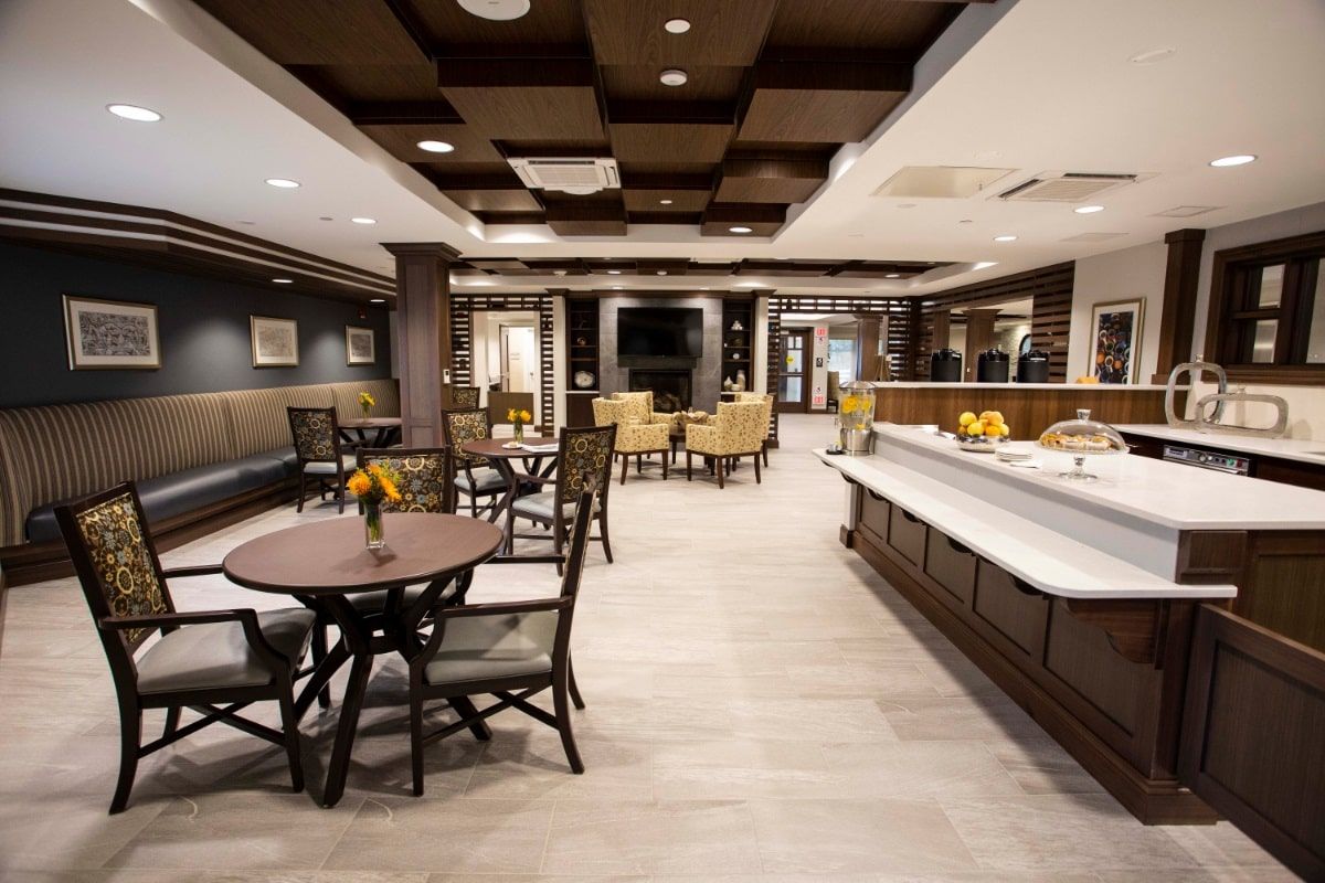 Senior living community interior at Sturges Ridge, featuring dining area, lounge, and modern amenities.