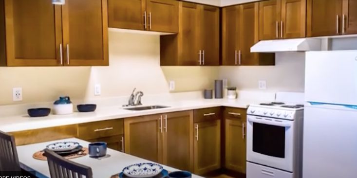 Interior view of Westmont of Milpitas senior living community kitchen with modern appliances.
