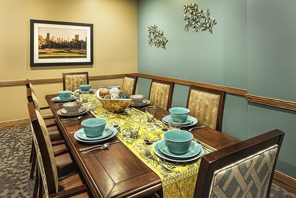 Interior view of Prairie Green At Dixie Crossing senior living community dining room.