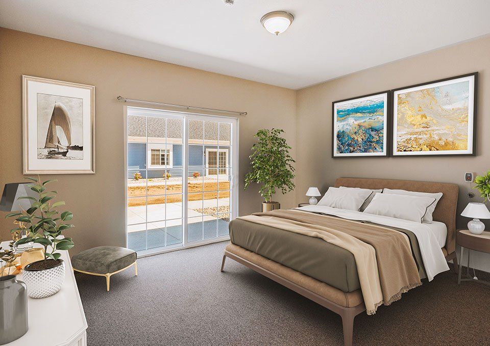 Interior view of Hampton Manor senior living community in Woodhaven featuring bedroom decor and architecture.