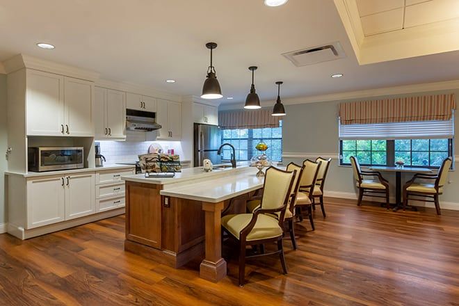 Interior view of Brookdale Sarasota Midtown senior living community featuring a well-designed kitchen and dining area.