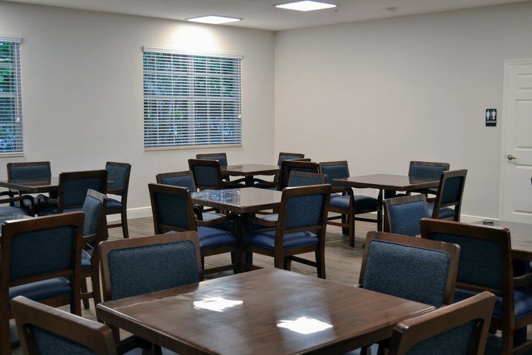 Interior view of Banyan Place senior living community featuring a cafeteria-style dining room.