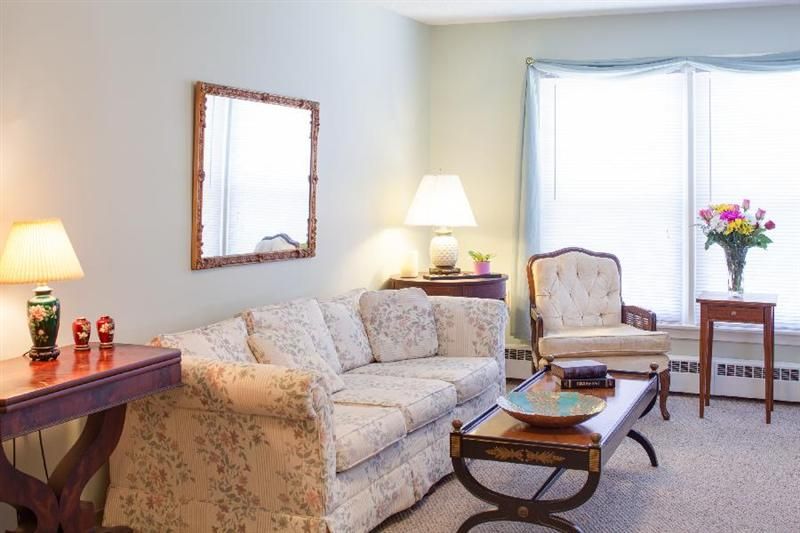 Interior view of Langdon Place of Exeter senior living community featuring cozy furniture and decor.