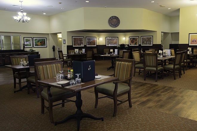 Interior view of Brookdale Dowlen Oaks senior living community featuring dining area and decor.