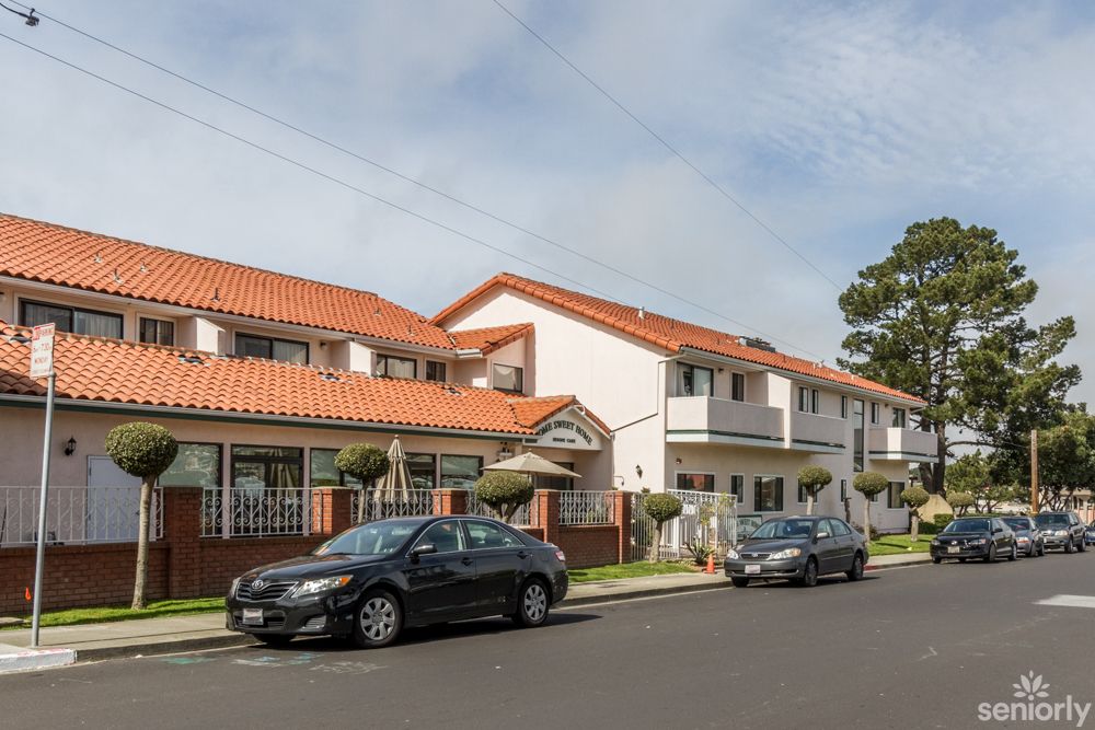 Senior living community, Home Sweet Home, featuring modern architecture and transportation in an urban suburb.