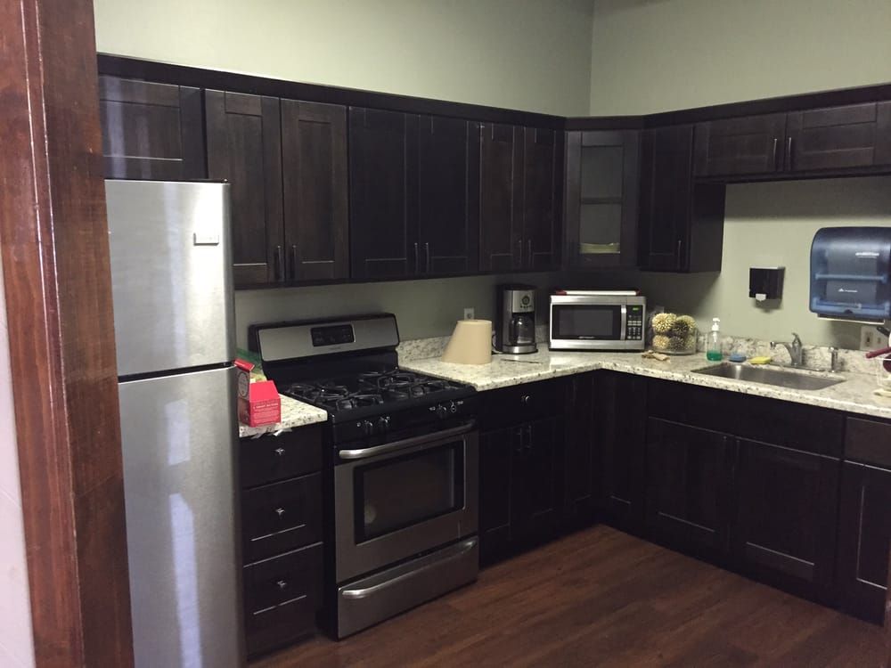 Interior view of the well-equipped kitchen in The Rehabilitation Center of Oakland's senior living community.
