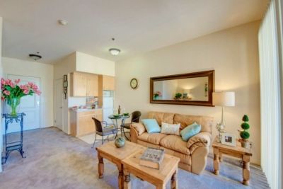 Interior view of Regency Grand of West Covina, featuring elegant furniture and decor in a comfortable living room setting.