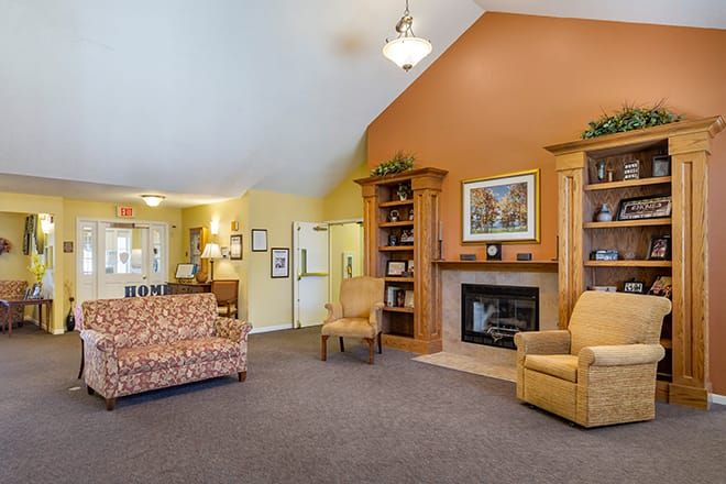 Interior view of Brookdale Valparaiso senior living community featuring cozy decor and furniture.