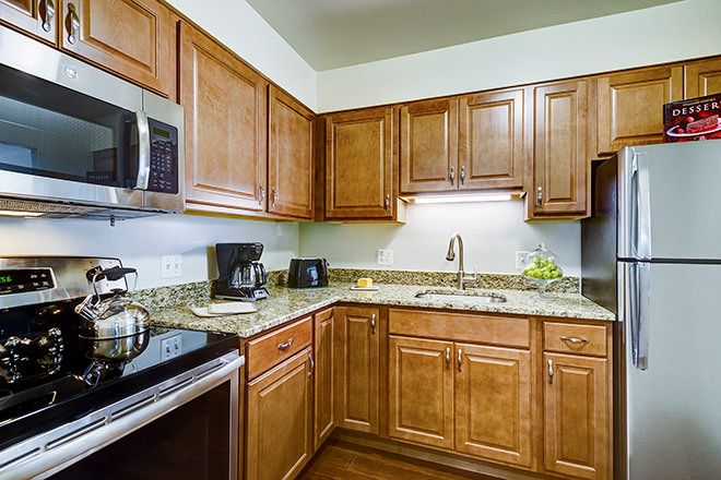 Interior view of Brookdale Northbrook senior living community kitchen with modern appliances.
