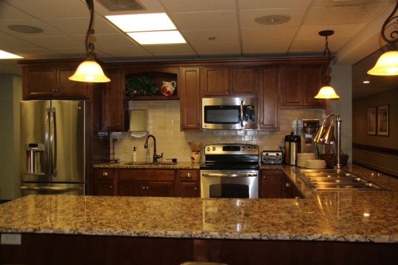 Interior view of Whitney Place At Northbridge senior living community featuring a well-equipped kitchen.