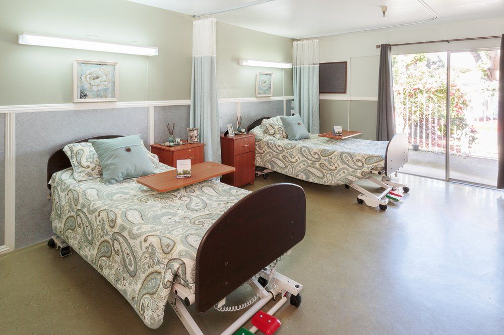 Interior view of Yuba City Post Acute senior living community with cozy bedroom decor.
