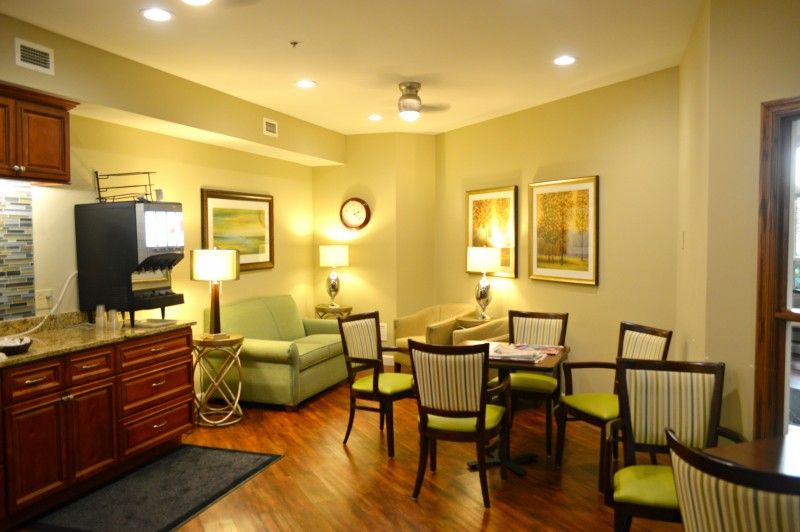 Interior view of Bethesda Gardens Kirkwood senior living community with art, furniture, and electronics.