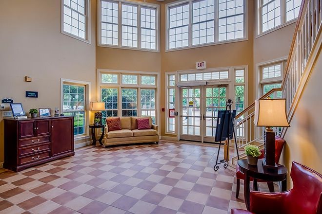 Interior view of Wyndham Court of Plano senior living community featuring modern furniture and amenities.