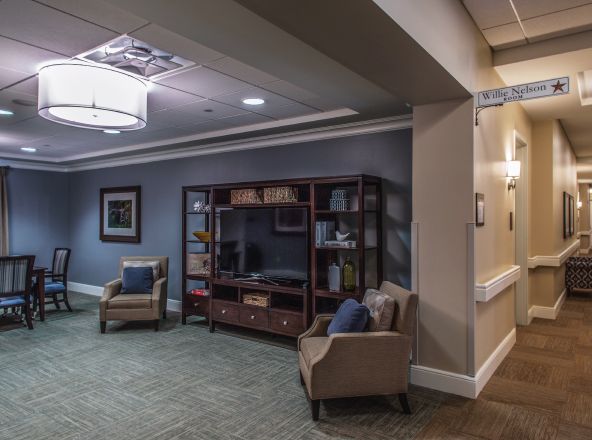 Interior view of Legacy At Crystal Falls senior living community featuring modern decor and electronics.