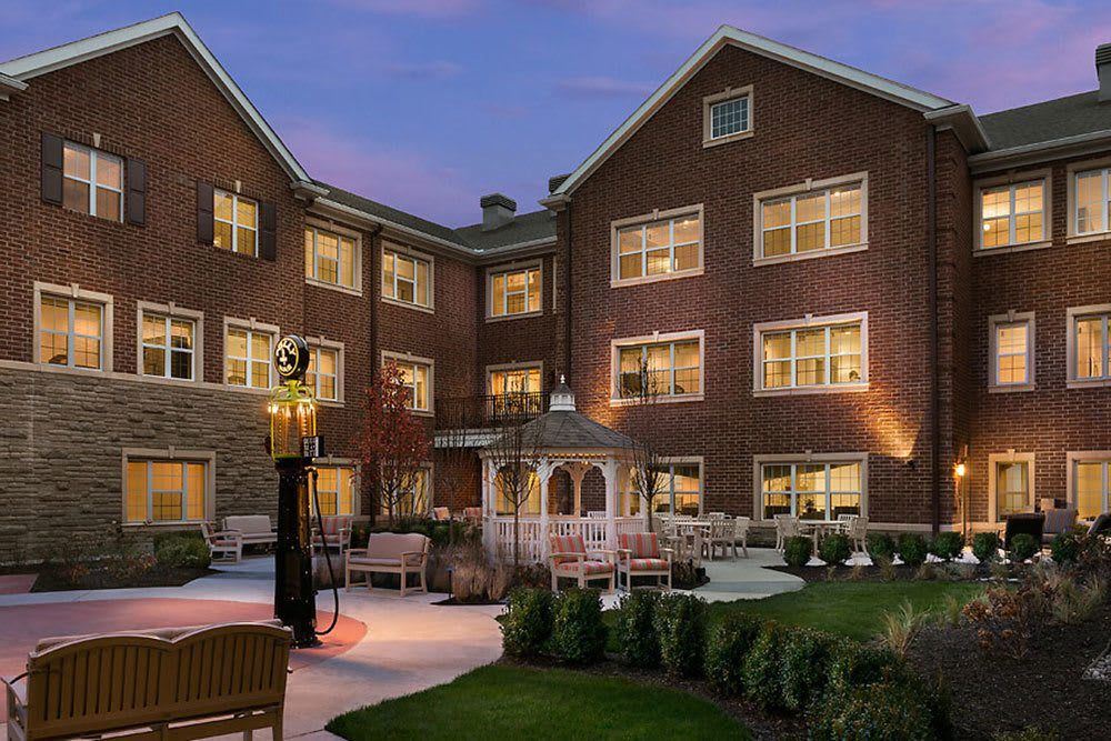Senior living community, Cedarbrook of Bloomfield Hills, featuring condos, green spaces, and amenities.