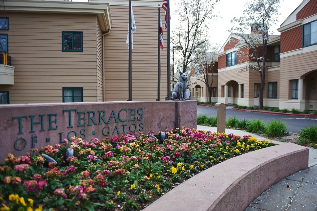 Senior living community, The Terraces Of Los Gatos, featuring lush gardens, pets, and modern condos.