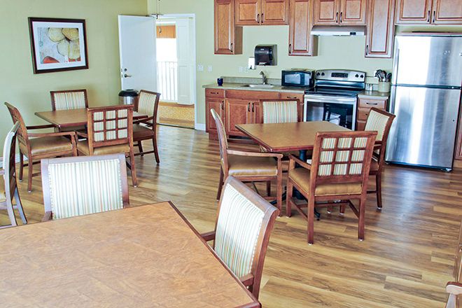 Interior view of Brookdale Loma Linda senior living community featuring dining and kitchen area.